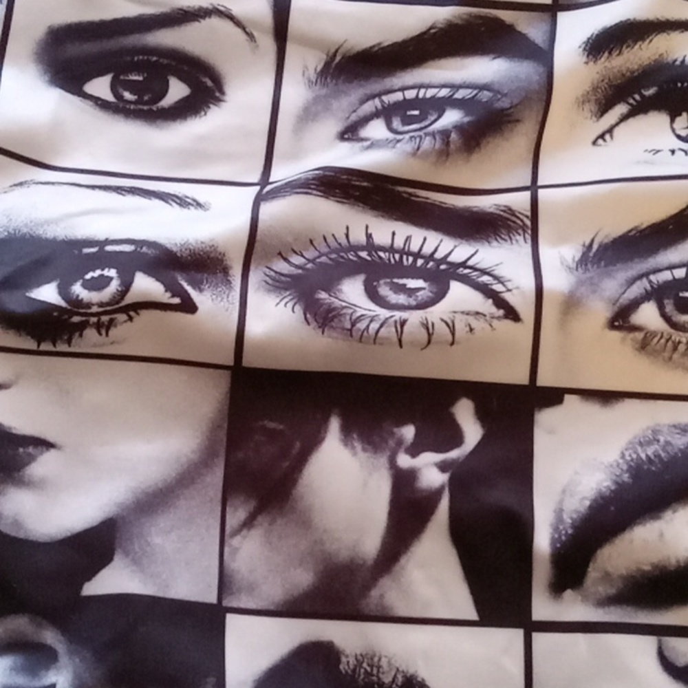 Top, with eyes images. Size S. White and black.